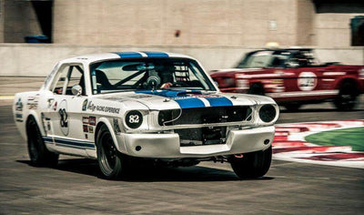 Get behind the wheel of a vintage mustang by Course Vintage